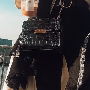 Black croc print shoulder bag